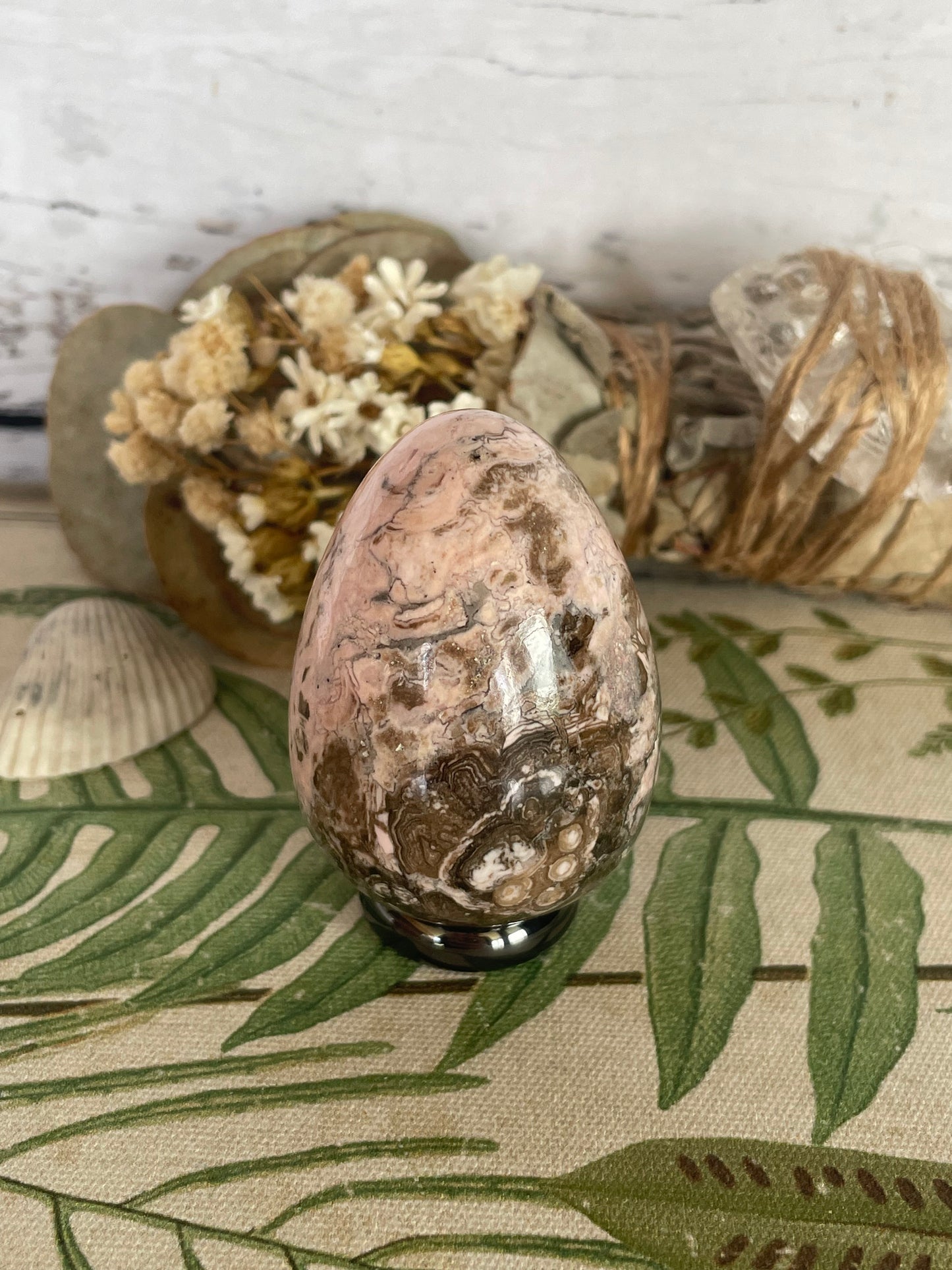Rhodochrosite Egg Includes Hematite Ring