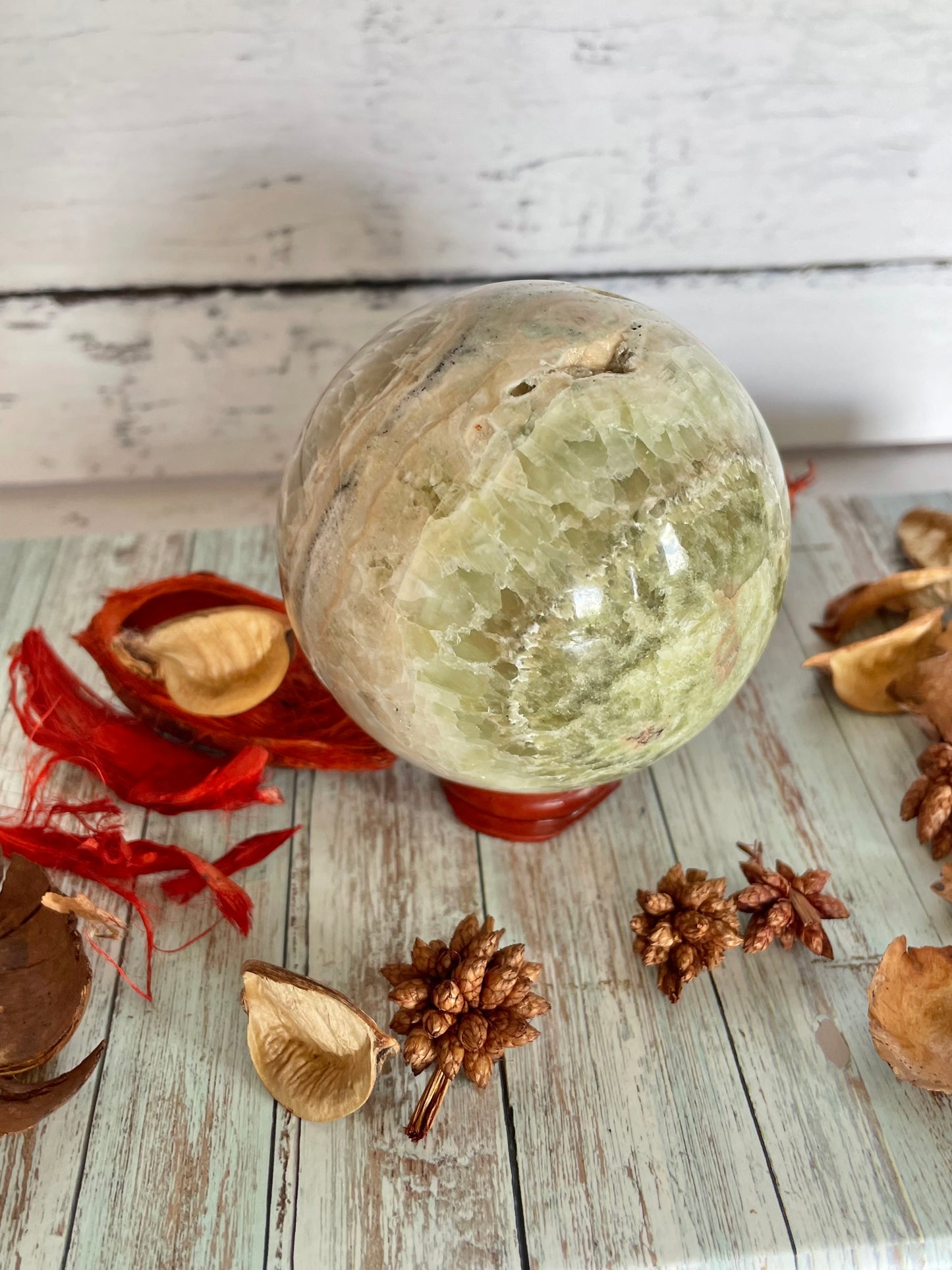 Green Calcite  Sphere Includes Wooden Holder