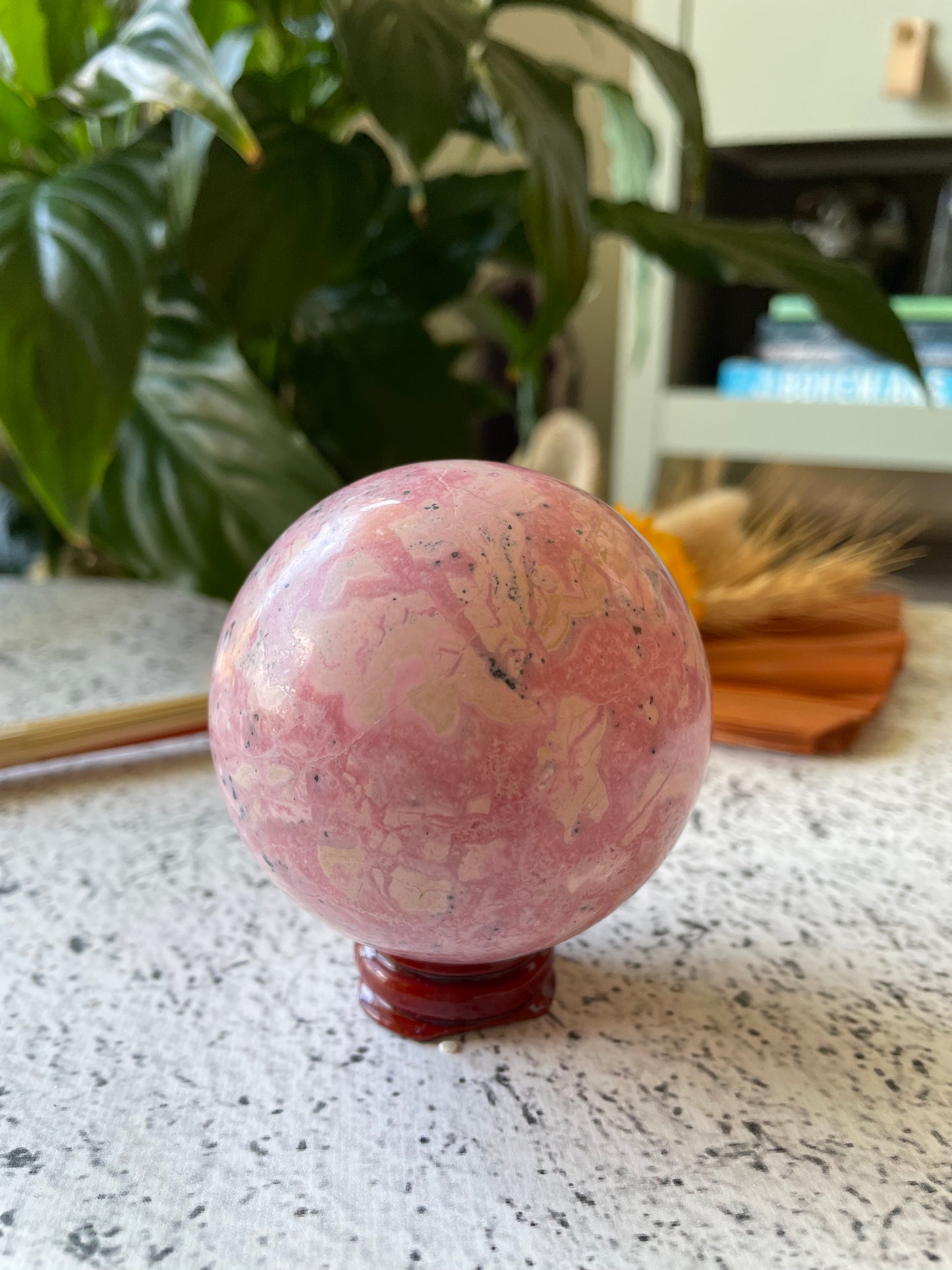 Rhodonite Sphere Includes Wooden Holder